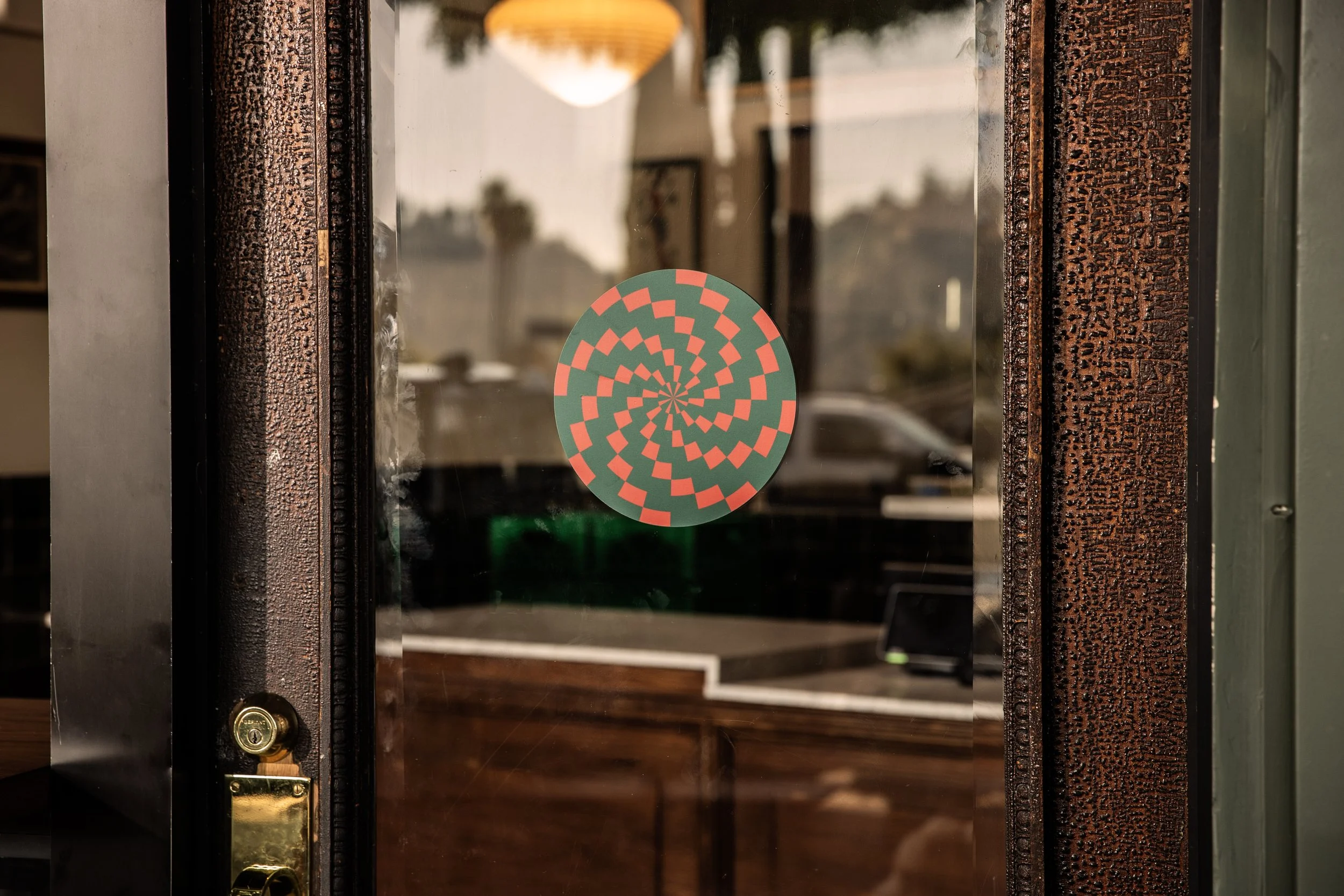 Shins green and red logo icon on door